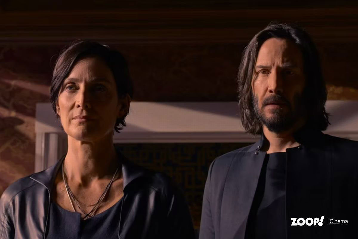 Keanu Reeves e Carrie-Anne Moss como Neo e Trinity em 'Matrix Ressurectios'. (imagem/Divulgação)